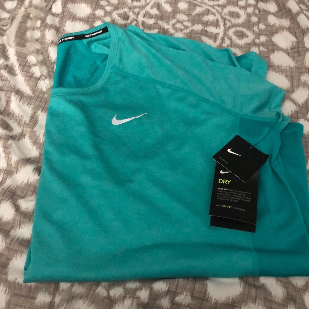 Teal women’s workout shirt.